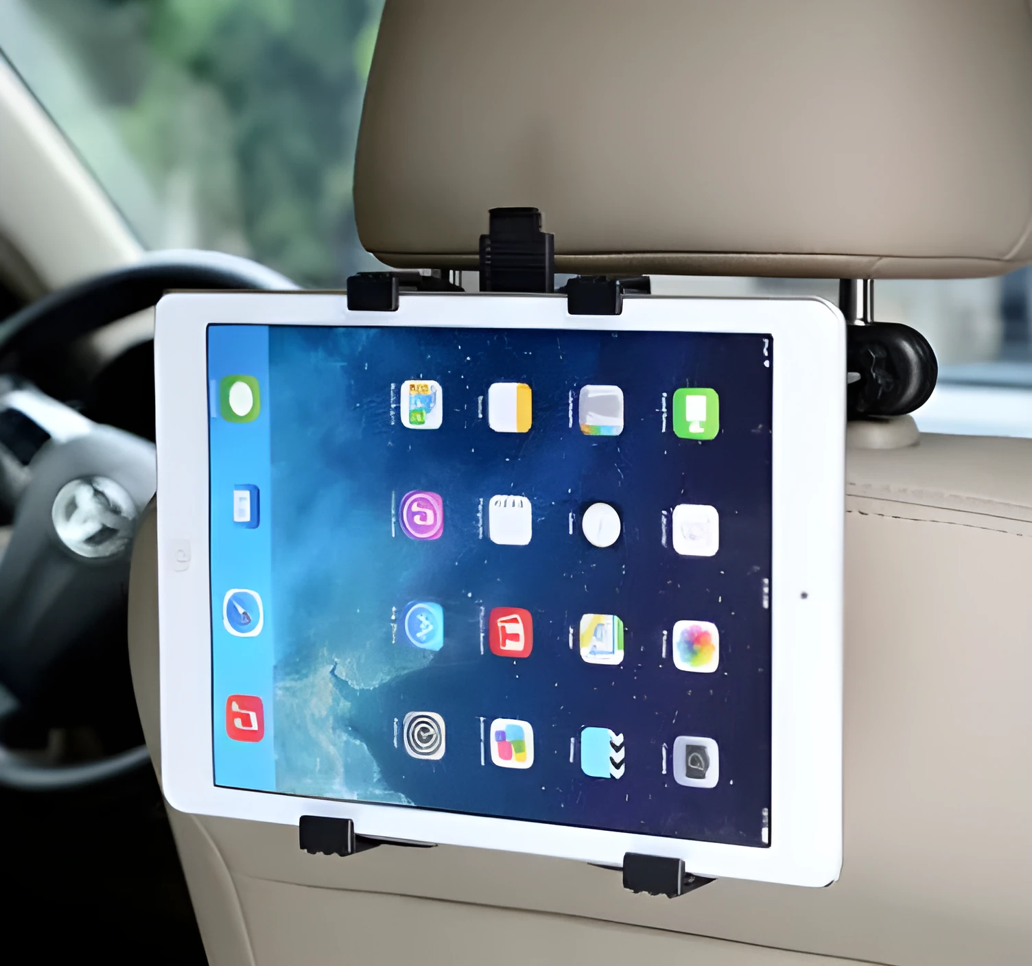Black car tablet holder mounted on headrest with adjustable bracket for rear seat passengers