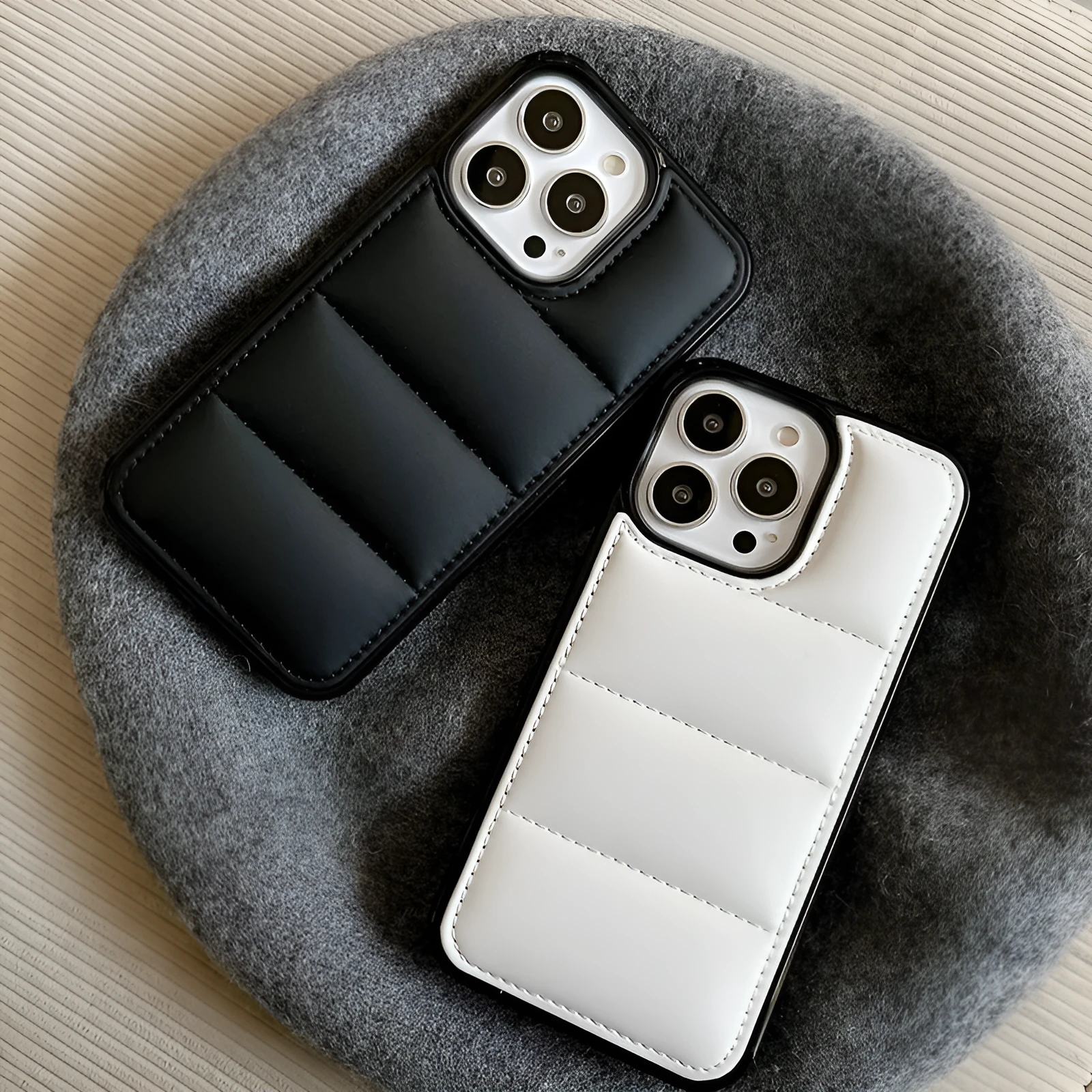 Candy Down Jacket shaped solid colour iPhone case in black, white, rose red, and green.