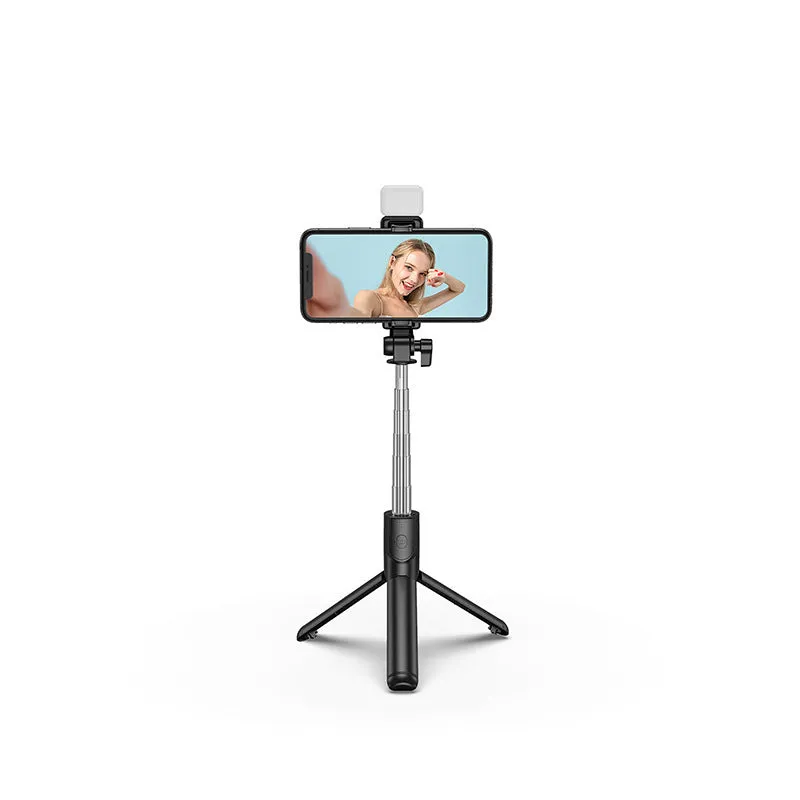 Aluminium alloy Bluetooth selfie stick with integrated tripod legs and 360-degree rotating phone holder in black.
