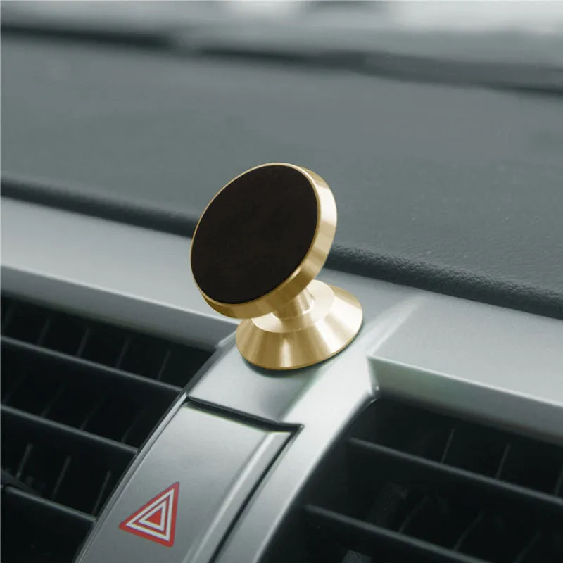 Universal magnetic car phone holder in black, silver or gold measuring 35.5mm by 40mm
