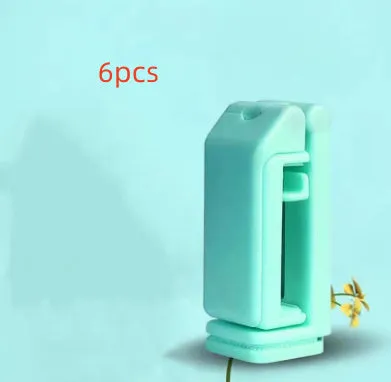 H22 Black colour 360-degree rotating collapsible mobile phone desktop holder on a wooden table.