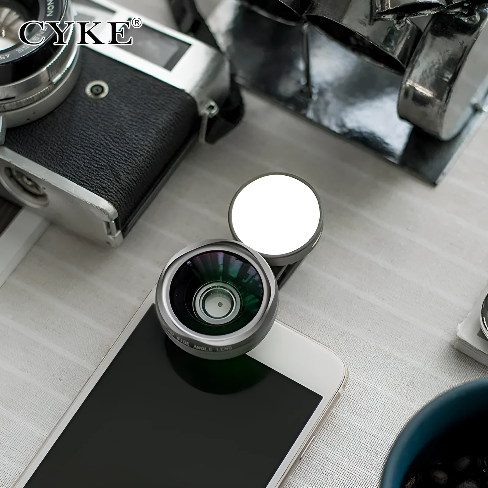 Smartphone camera lens attachment kit with wide-angle lens and LED ring light in black, red, and silver grey colour options