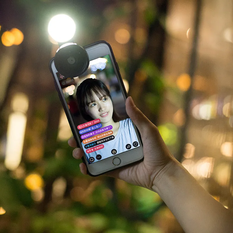 Smartphone camera lens attachment kit with wide-angle lens and LED ring light in black, red, and silver grey colour options