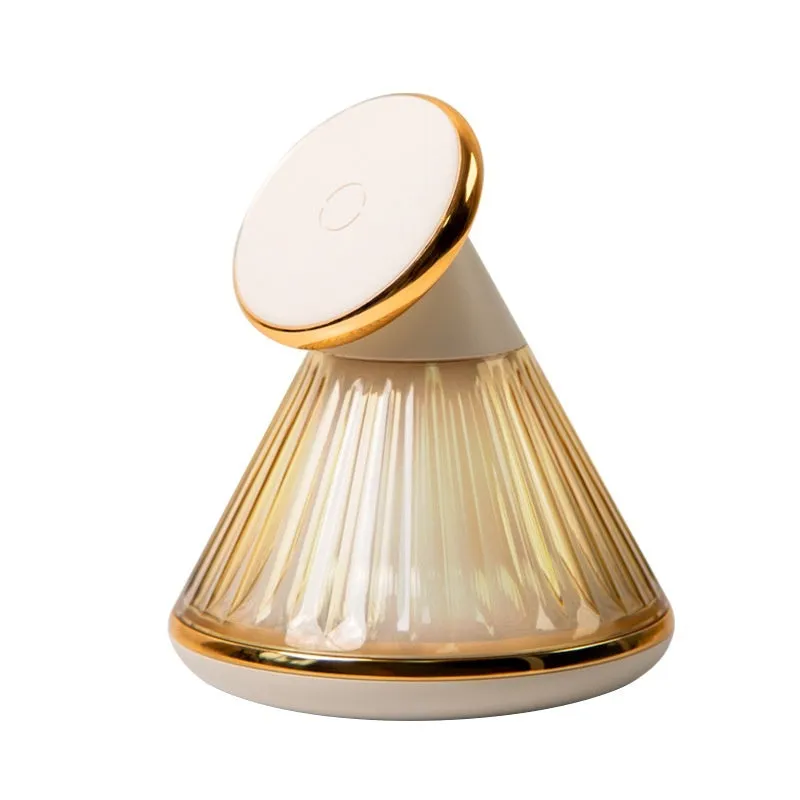 Night table lamp with wireless charging seat in champagne gold finish showing brightness controls