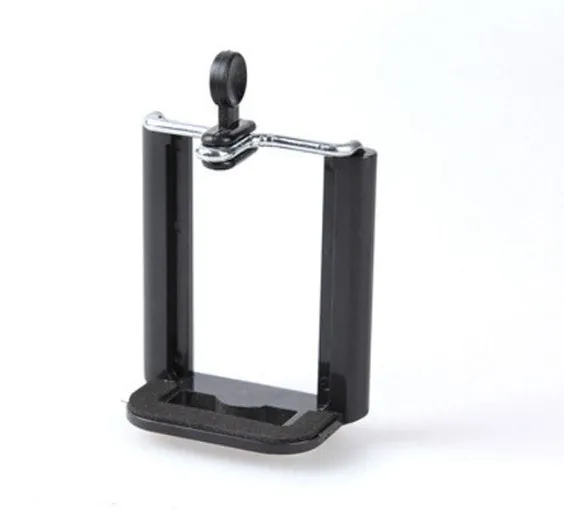 Mini flexible aluminium desktop tripod with ball head extended, alongside a universal U-shaped black phone clip.