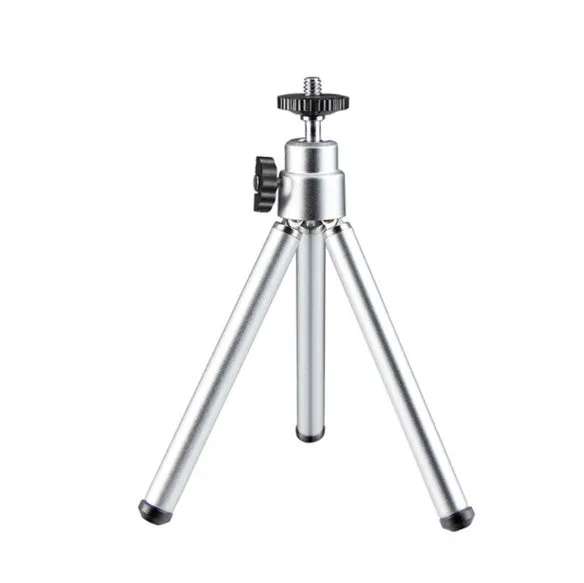 Mini flexible aluminium desktop tripod with ball head extended, alongside a universal U-shaped black phone clip.