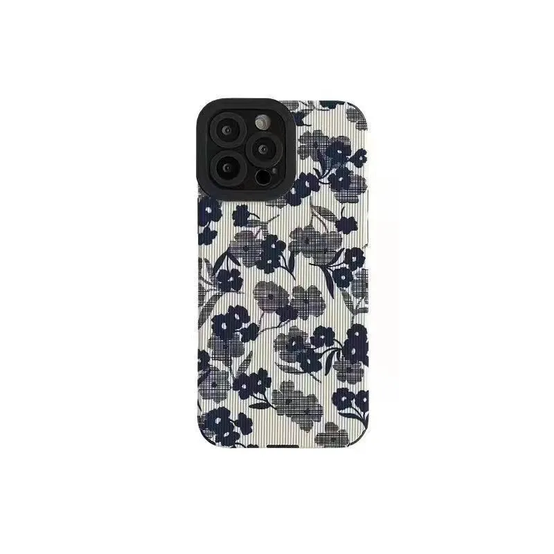 Silicone iPhone case with Chinese-style geometric metal-stamped design on imitation leather