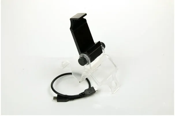 Black PS4 controller clip holding a mobile phone, with a micro USB OTG cable connected.
