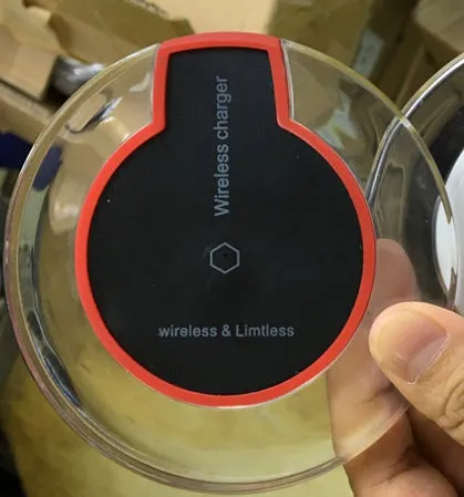 Slim black Qi wireless charger receiver module for Samsung and iPhone phones