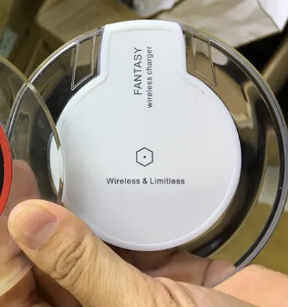 Slim black Qi wireless charger receiver module for Samsung and iPhone phones