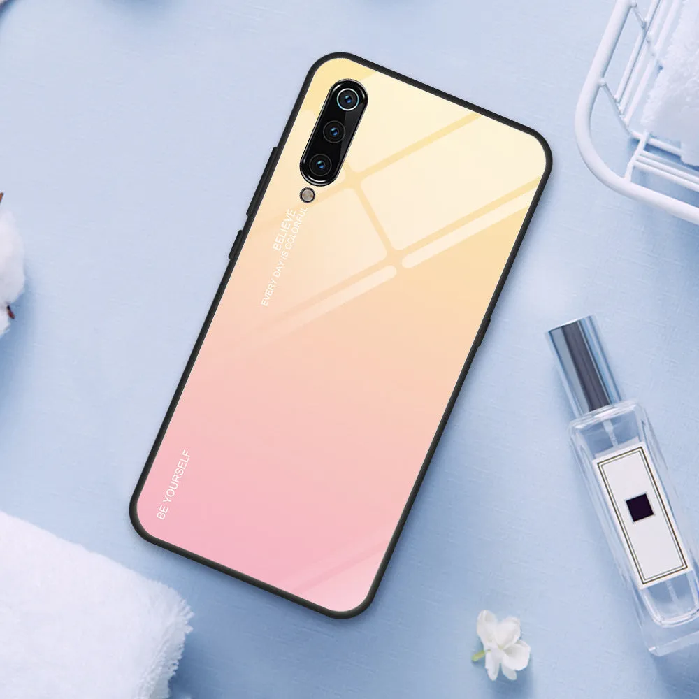 Gradient colour shift phone case with tempered glass back and TPU frame for Redmi smartphones.