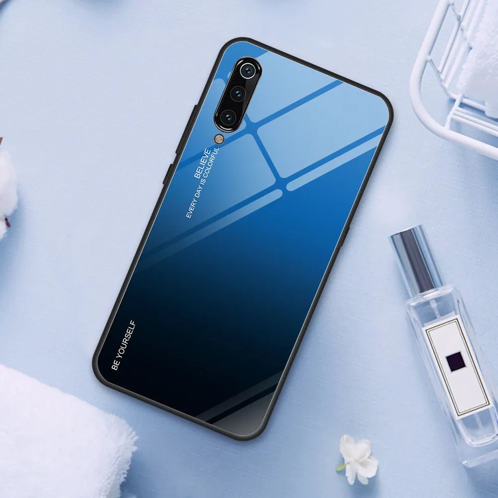 Gradient colour shift phone case with tempered glass back and TPU frame for Redmi smartphones.