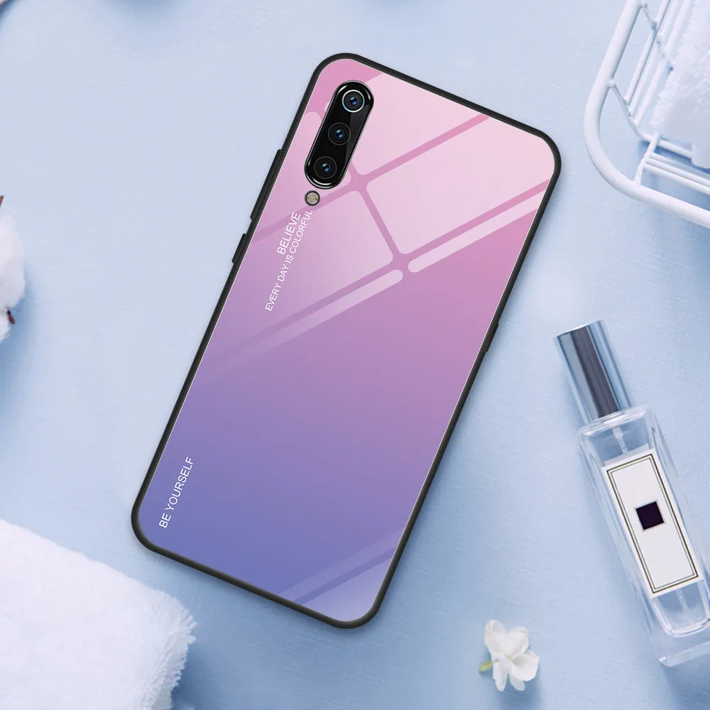 Gradient colour shift phone case with tempered glass back and TPU frame for Redmi smartphones.