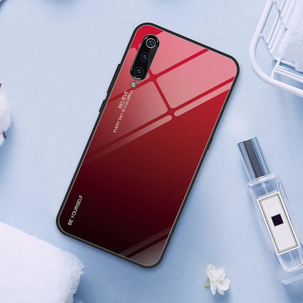 Gradient colour shift phone case with tempered glass back and TPU frame for Redmi smartphones.