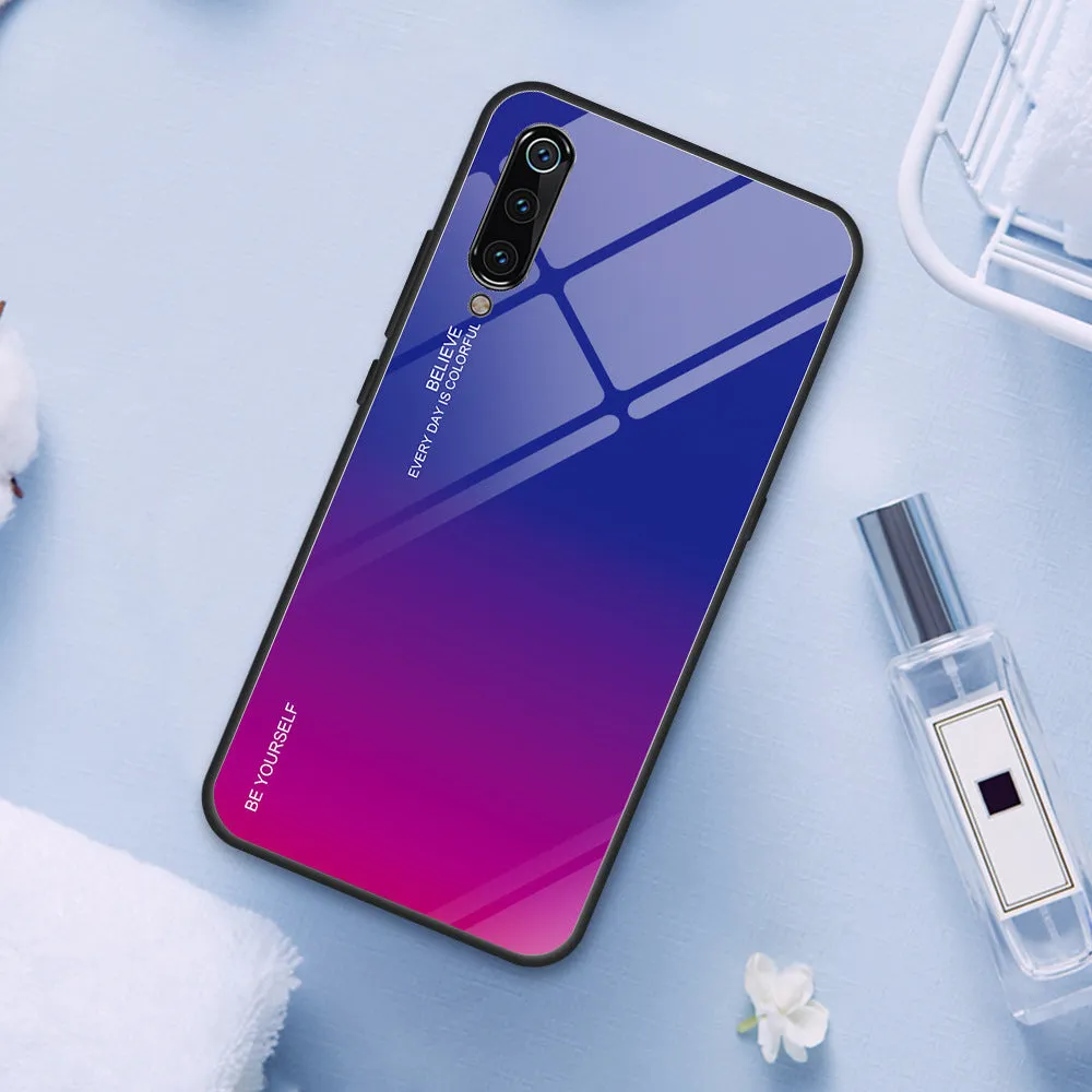 Gradient colour shift phone case with tempered glass back and TPU frame for Redmi smartphones.