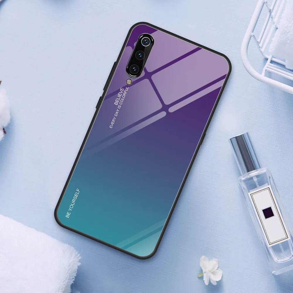Gradient colour shift phone case with tempered glass back and TPU frame for Redmi smartphones.