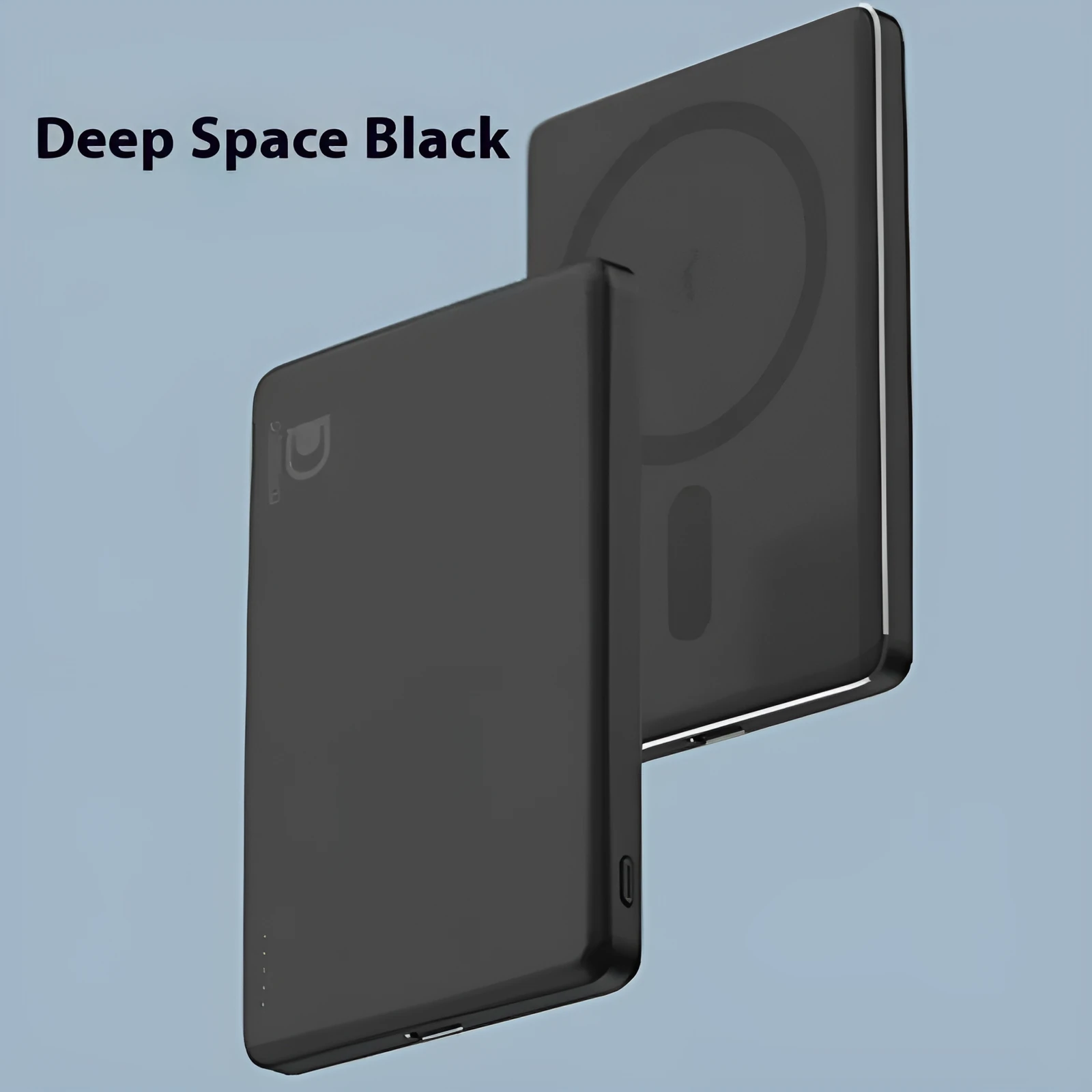 Slim aluminium magnetic power bank in deep space black colour, showing magnetic attachment to a smartphone.
