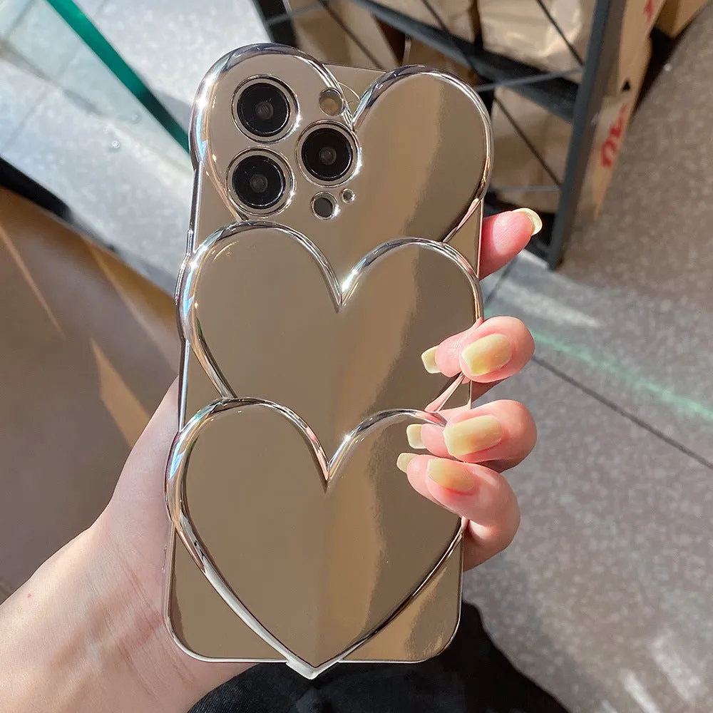 Soft TPU iPhone case with a silver three-dimensional love electroplating design on the back.