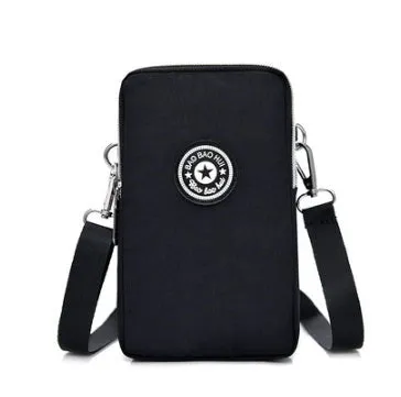 Vertical Oxford fabric ladies mobile phone bag with a zipper, shown in a printed design.