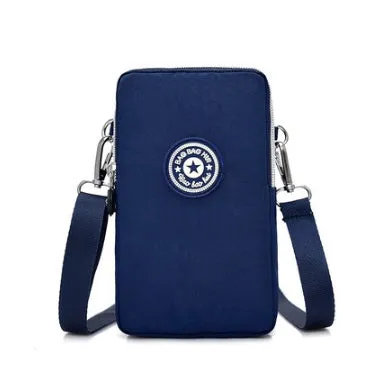Vertical Oxford fabric ladies mobile phone bag with a zipper, shown in a printed design.