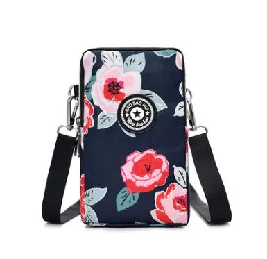 Vertical Oxford fabric ladies mobile phone bag with a zipper, shown in a printed design.
