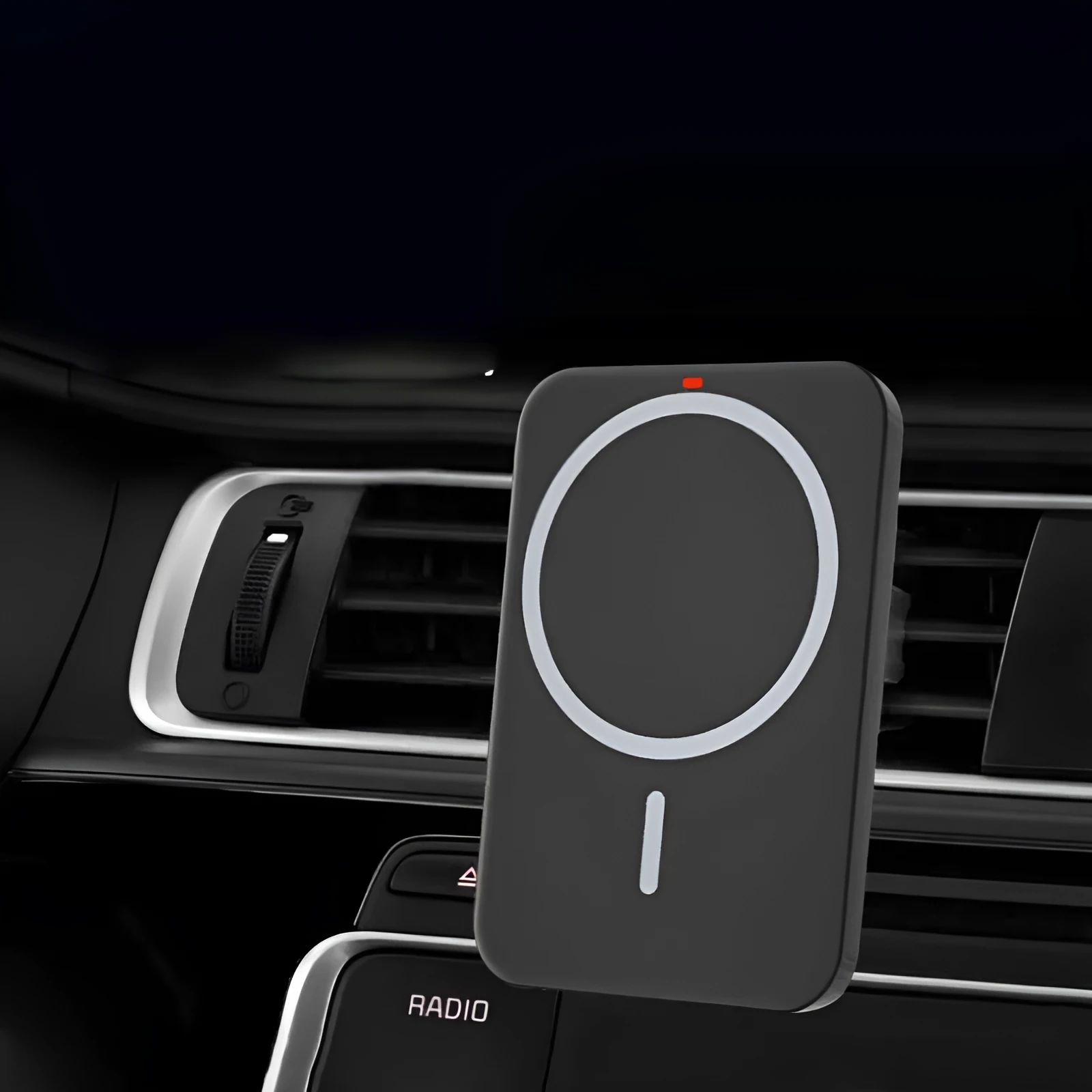 Black car magnetic wireless charger bracket mounted on car air vent with phone attached
