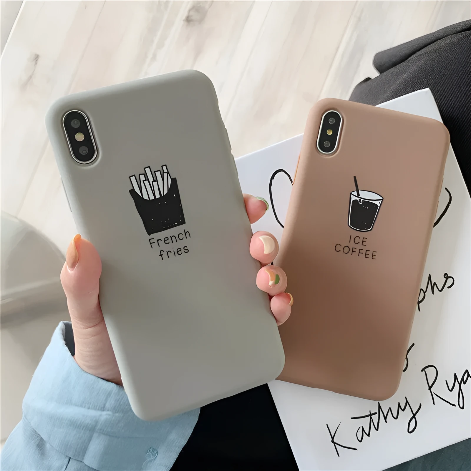 Silicone iPhone case with soft matte finish showing ice coffee and french fries couple patterns