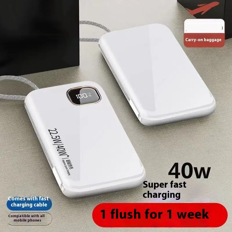 Black portable power bank with integrated charging cable showing compact 170mm x 68mm size.