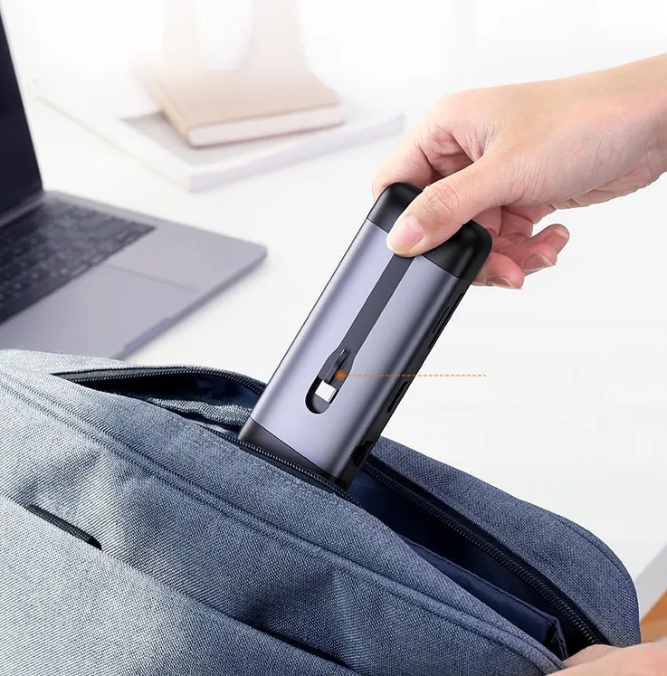 USB-C docking station hub with short cable showing HDMI, USB 3.0, PD charging, VGA, and Ethernet ports.