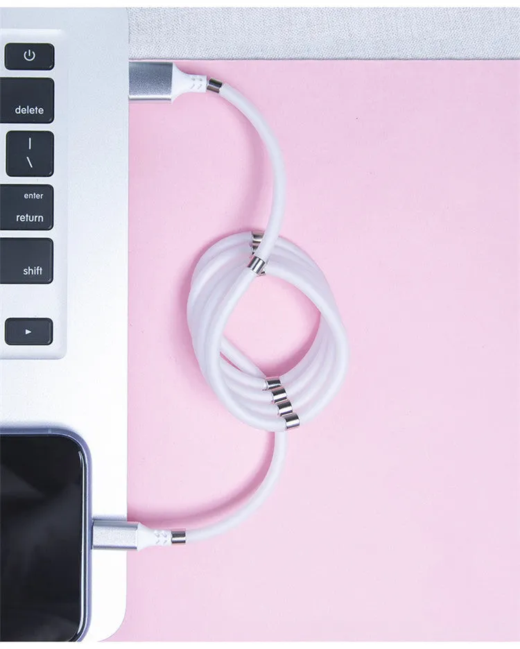 Black magnetic charging cable with Apple, Android, and Type-C compatibility showing aluminium alloy joints