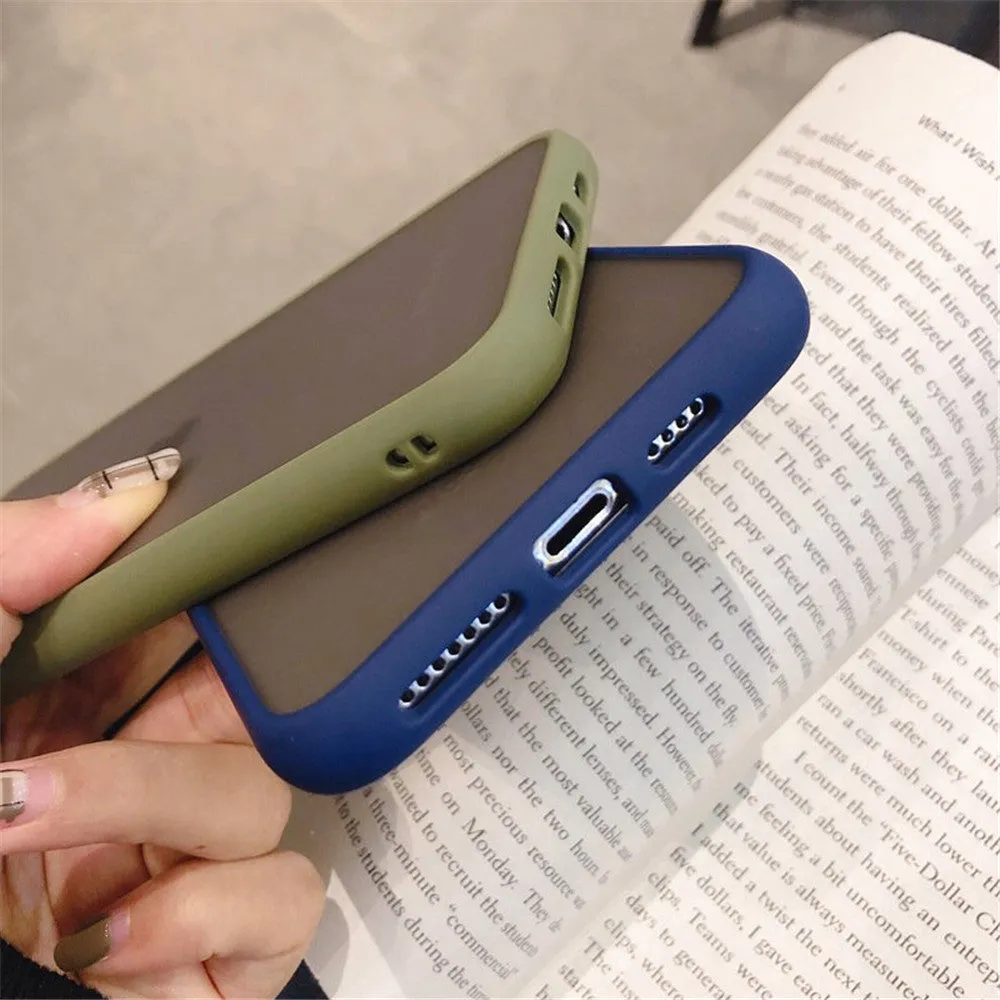 Transparent solid colour silicone shockproof protective case for iPhone on a dark background.