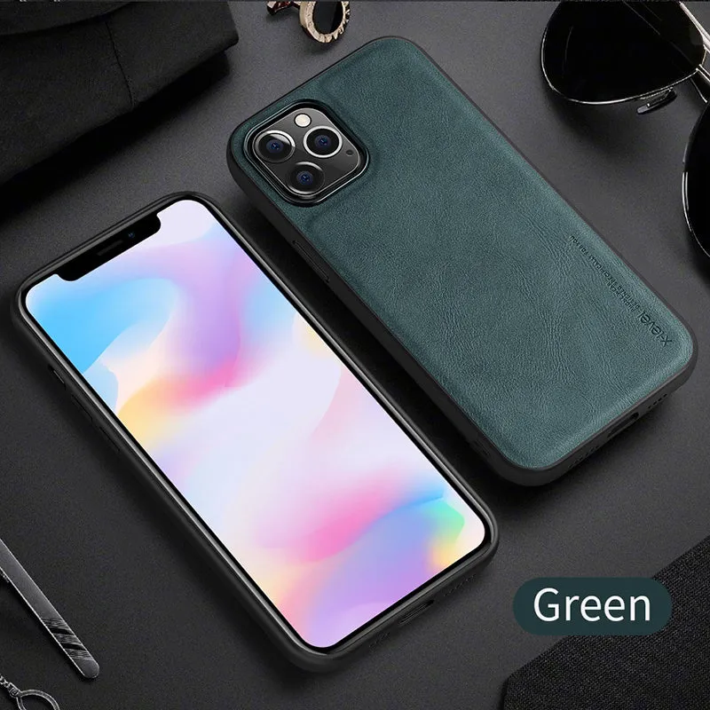 Black business leather phone case for iPhone 12 with PU leather and TPU frame on a wooden desk.