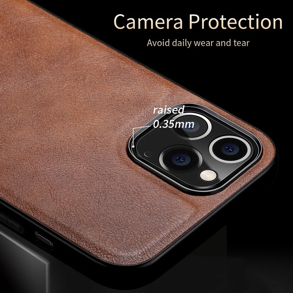 Black business leather phone case for iPhone 12 with PU leather and TPU frame on a wooden desk.
