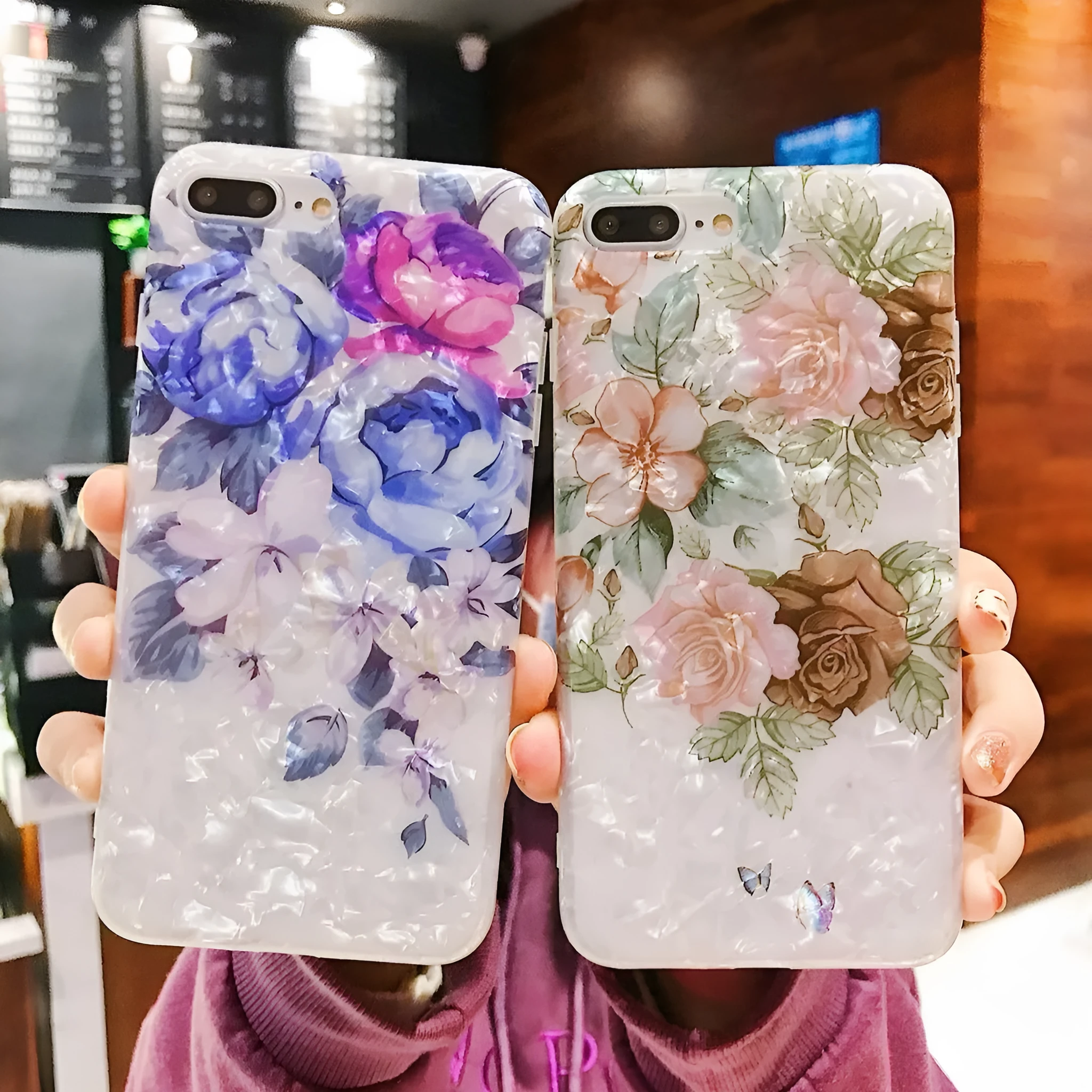 Dream Shell soft TPU iPhone case with rose flower pattern on back, shown in brown colour.
