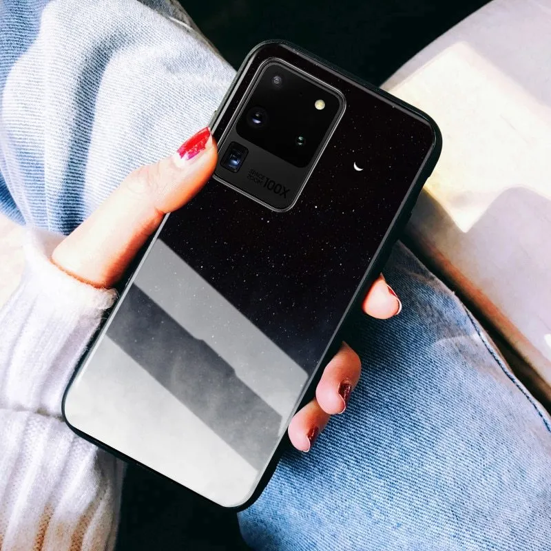 Black silicone phone case for Samsung Galaxy and iPhone smartphones showing port and camera openings