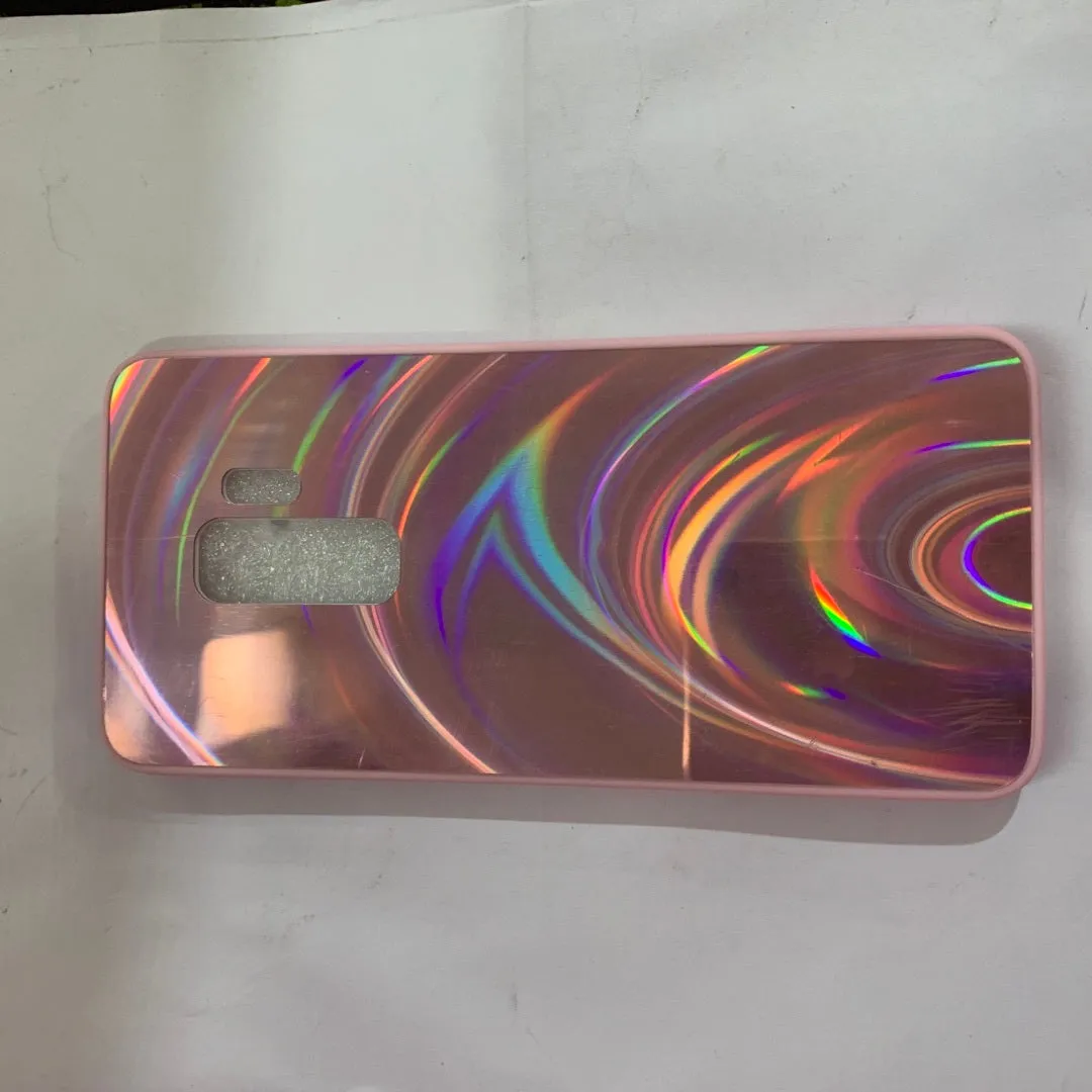 A 3D rainbow glitter gradient back cover case for a smartphone, showing its full-coverage design and sparkling finish.
