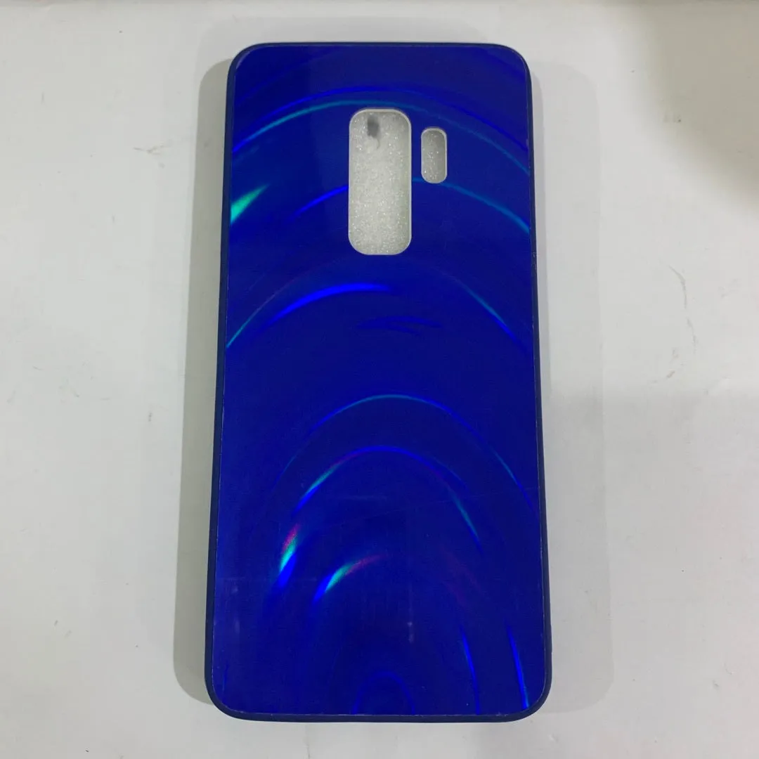 A 3D rainbow glitter gradient back cover case for a smartphone, showing its full-coverage design and sparkling finish.
