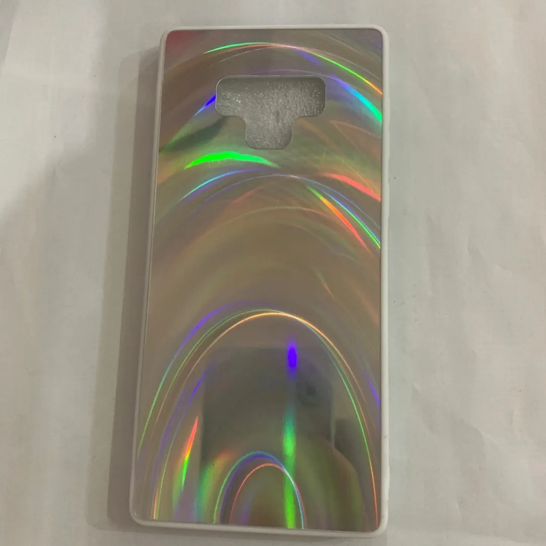 A 3D rainbow glitter gradient back cover case for a smartphone, showing its full-coverage design and sparkling finish.
