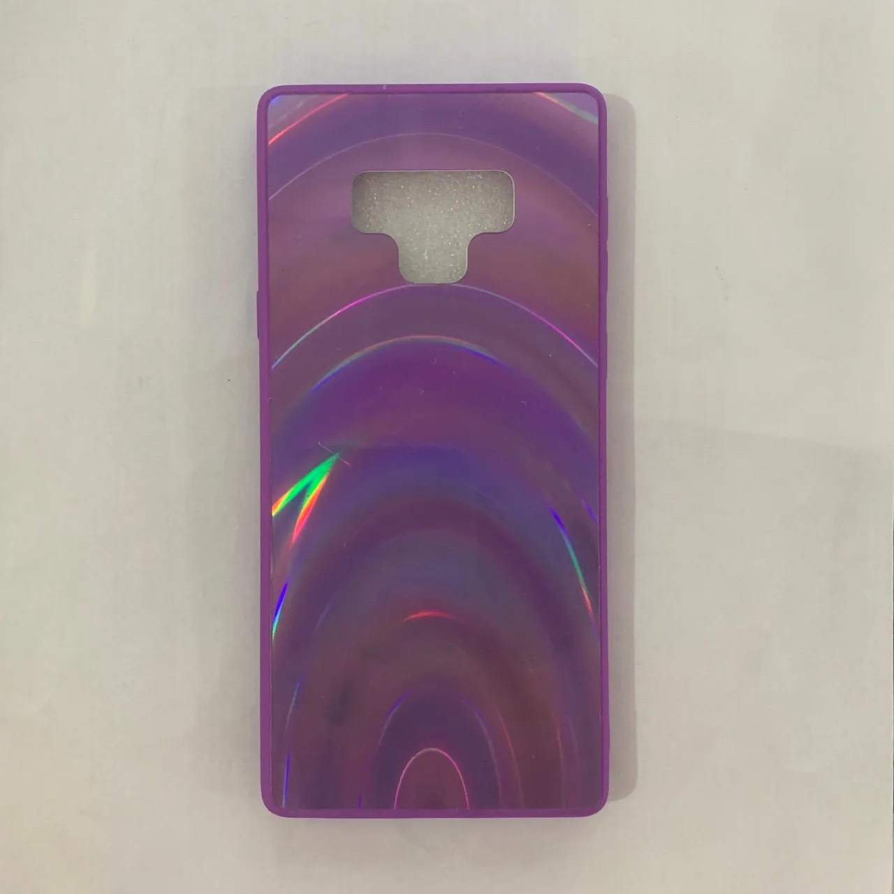A 3D rainbow glitter gradient back cover case for a smartphone, showing its full-coverage design and sparkling finish.