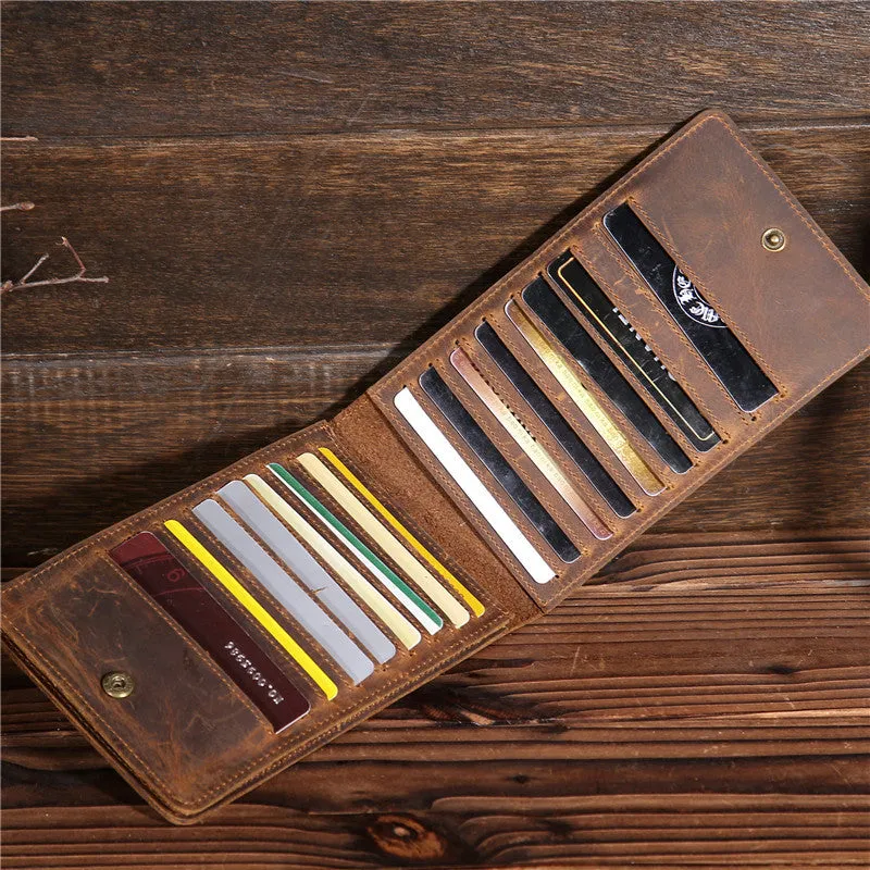 Men's long cowhide leather wallet showing card slots, money pocket, and mobile phone compartment.