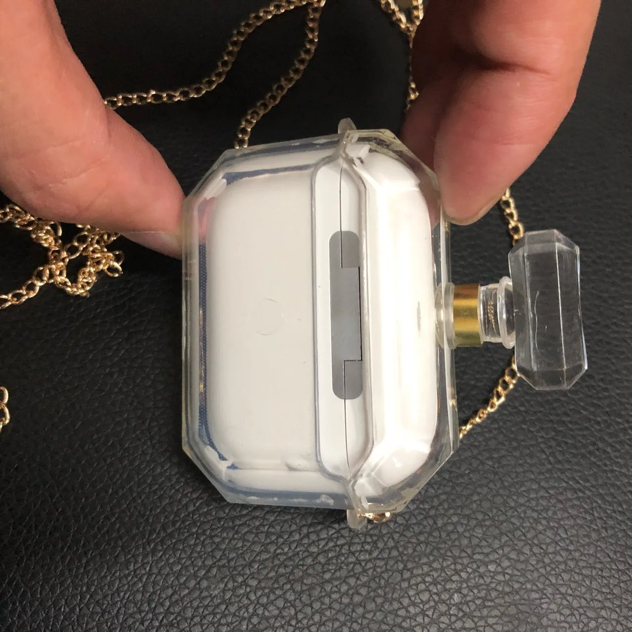 White perfume bottle design silicone protective case for Apple AirPods Pro charging box.