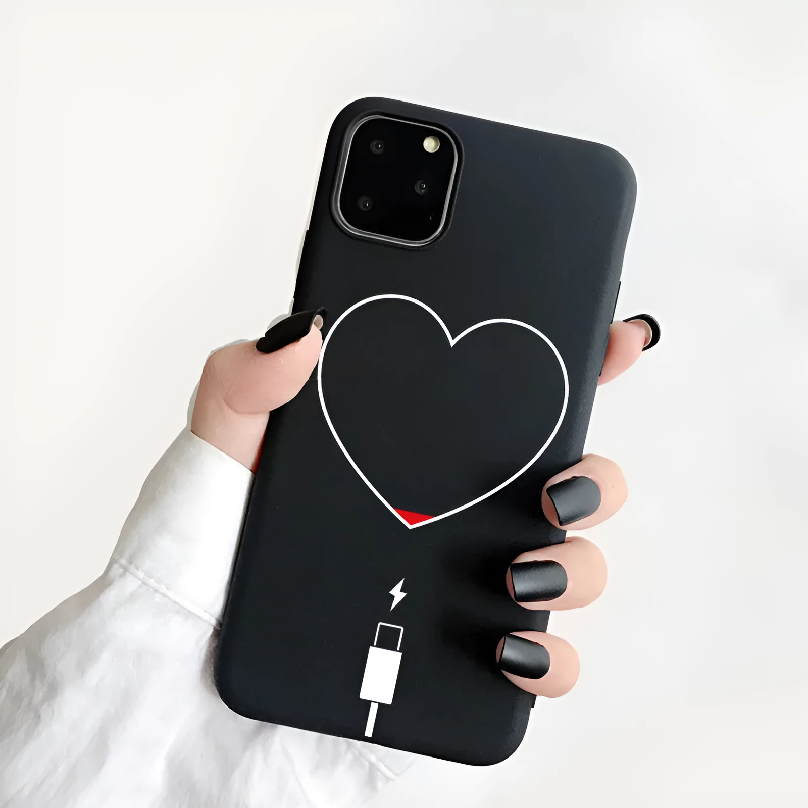 Frosted TPU iPhone case with a painted love-themed design on a smartphone.