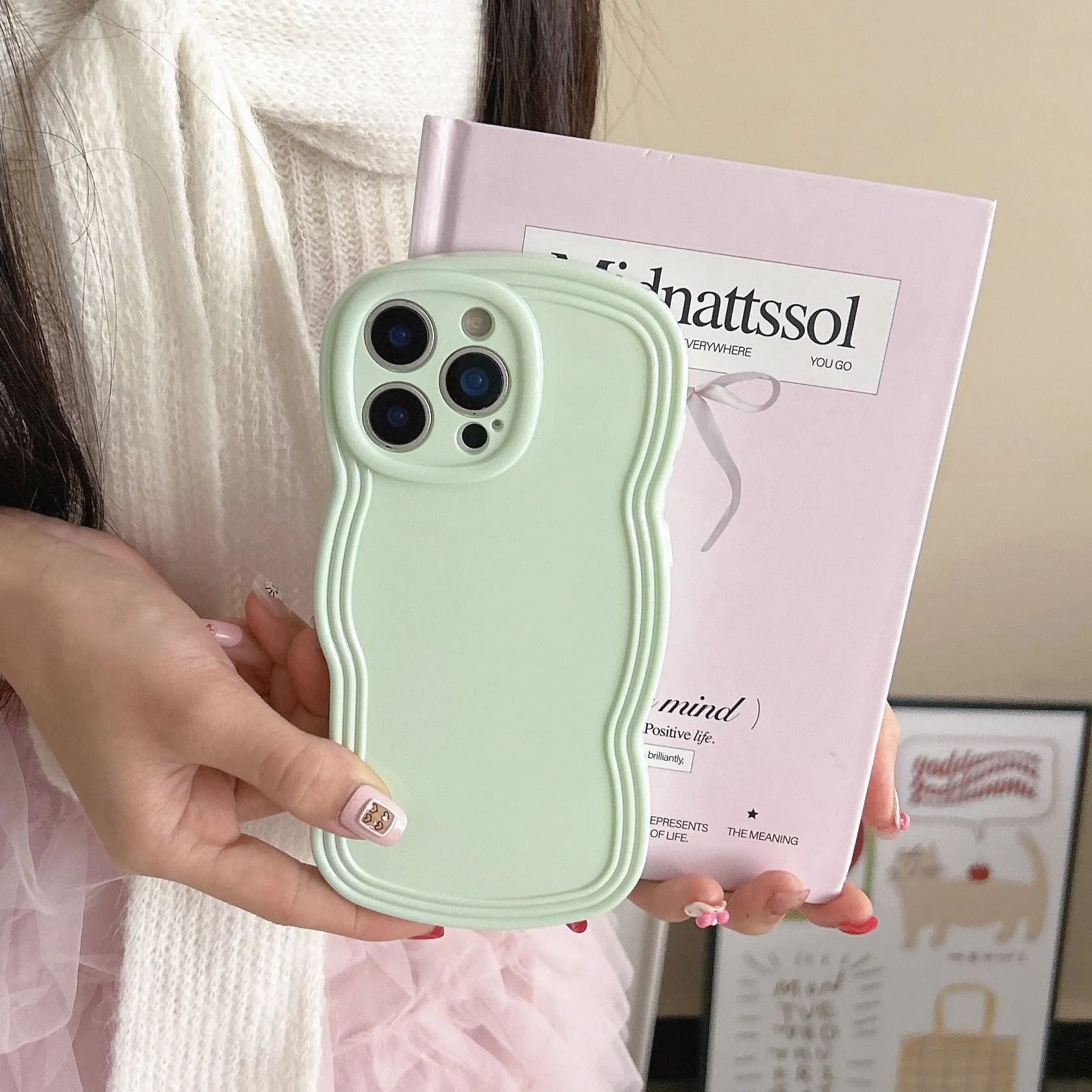 Cream candy colour wave pattern TPU phone case for iPhone, showing anti-fingerprint surface.