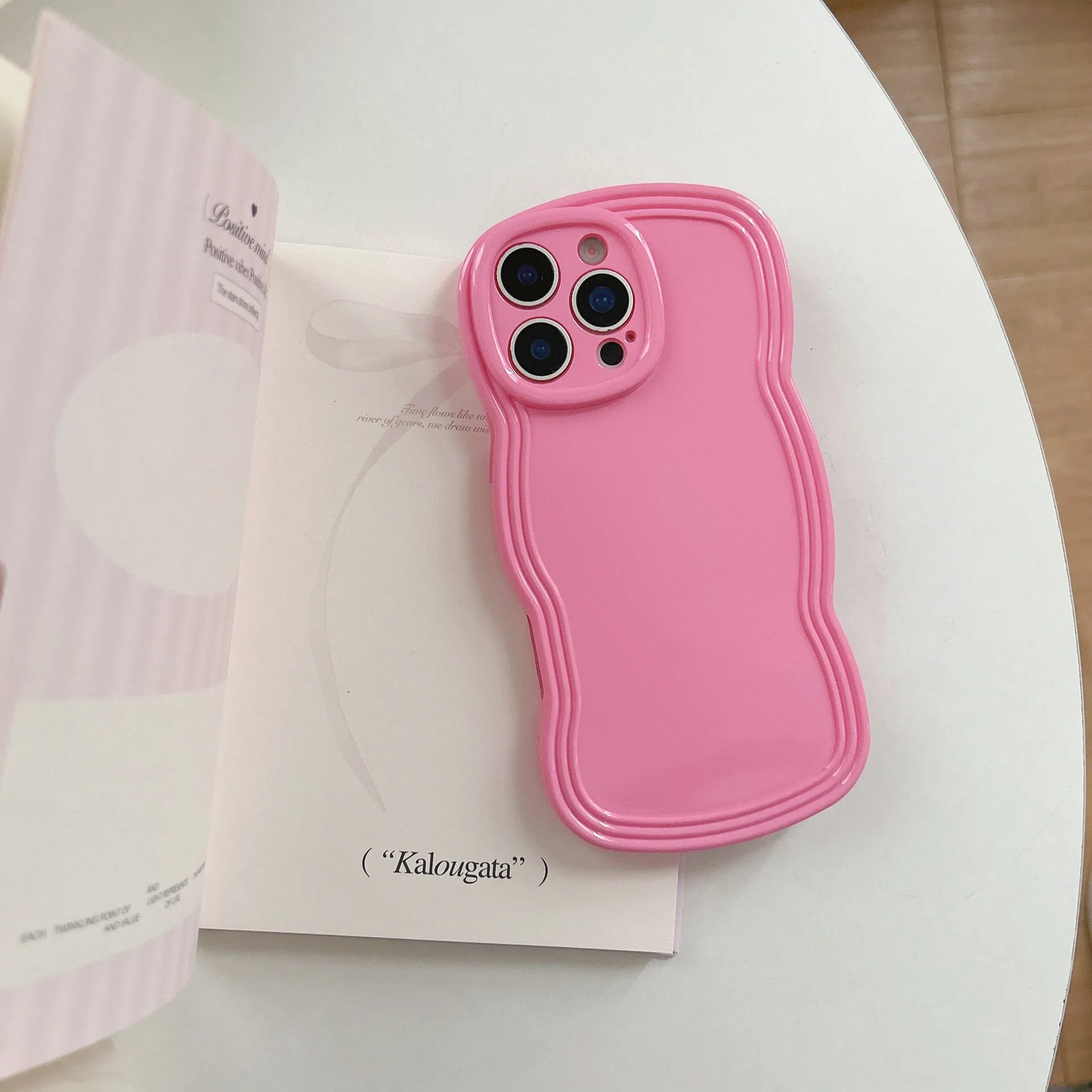 Cream candy colour wave pattern TPU phone case for iPhone, showing anti-fingerprint surface.