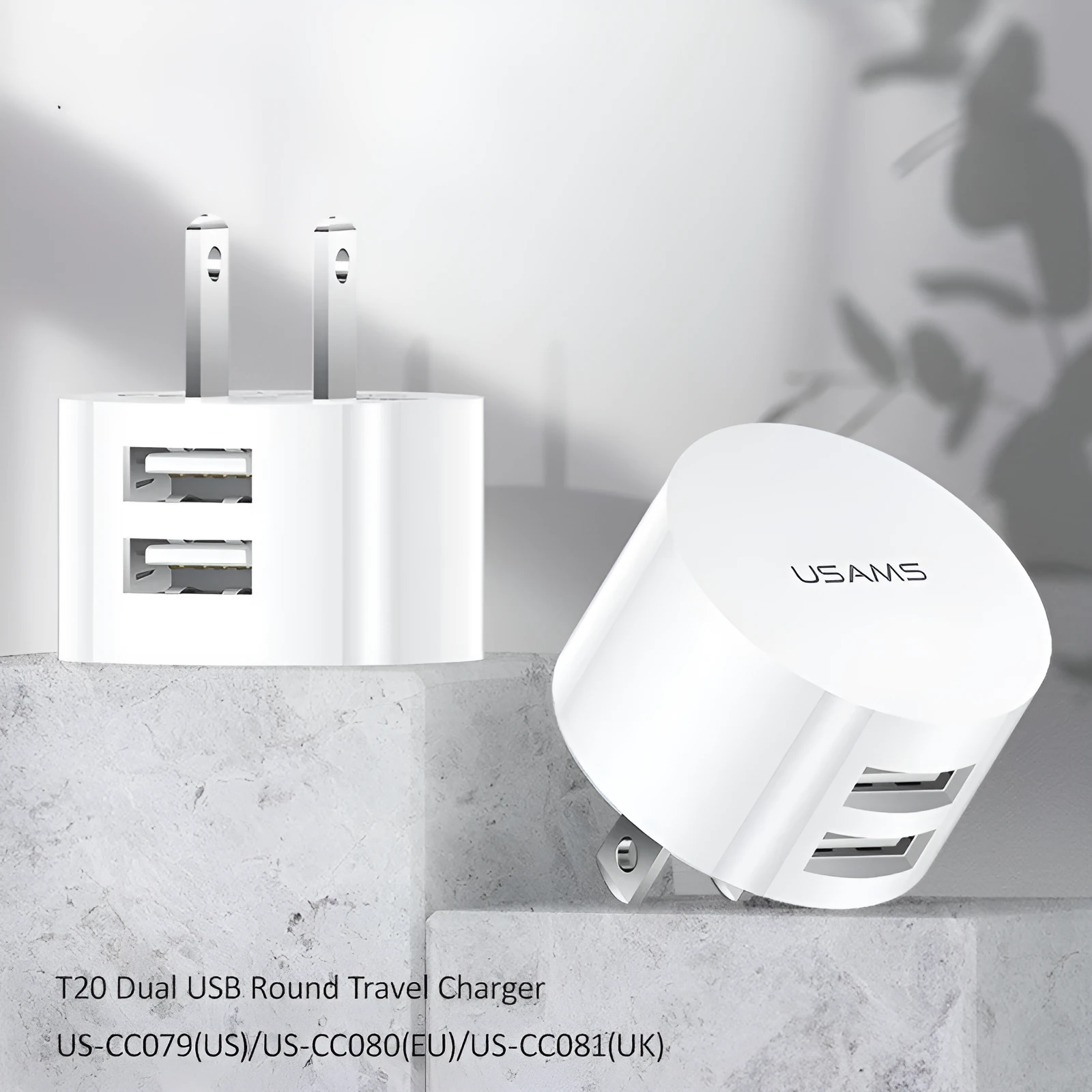 White portable USB phone charger with universal international adapter for UK US and EU power sockets