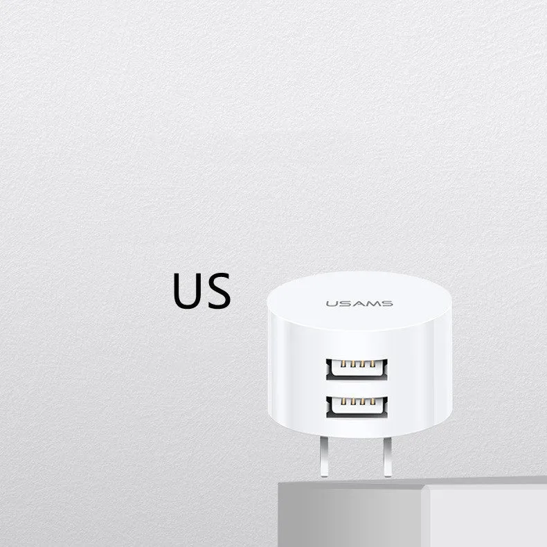 White portable USB phone charger with universal international adapter for UK US and EU power sockets