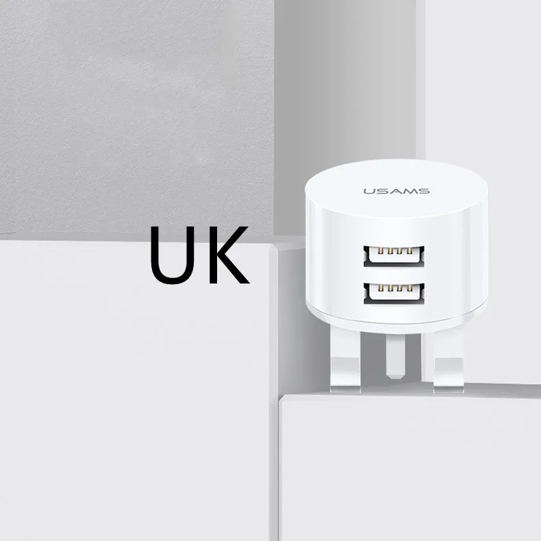 White portable USB phone charger with universal international adapter for UK US and EU power sockets