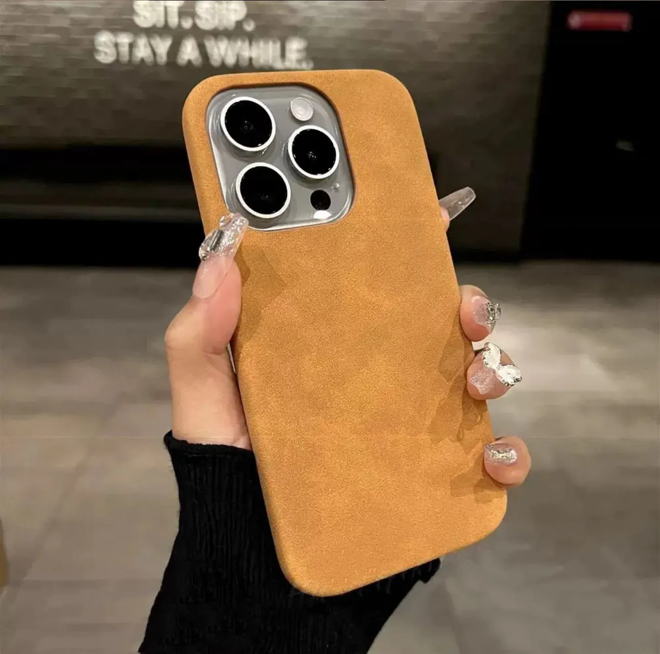 Solid colour suede imitation leather iPhone case in half-pack design showing shockproof protection features