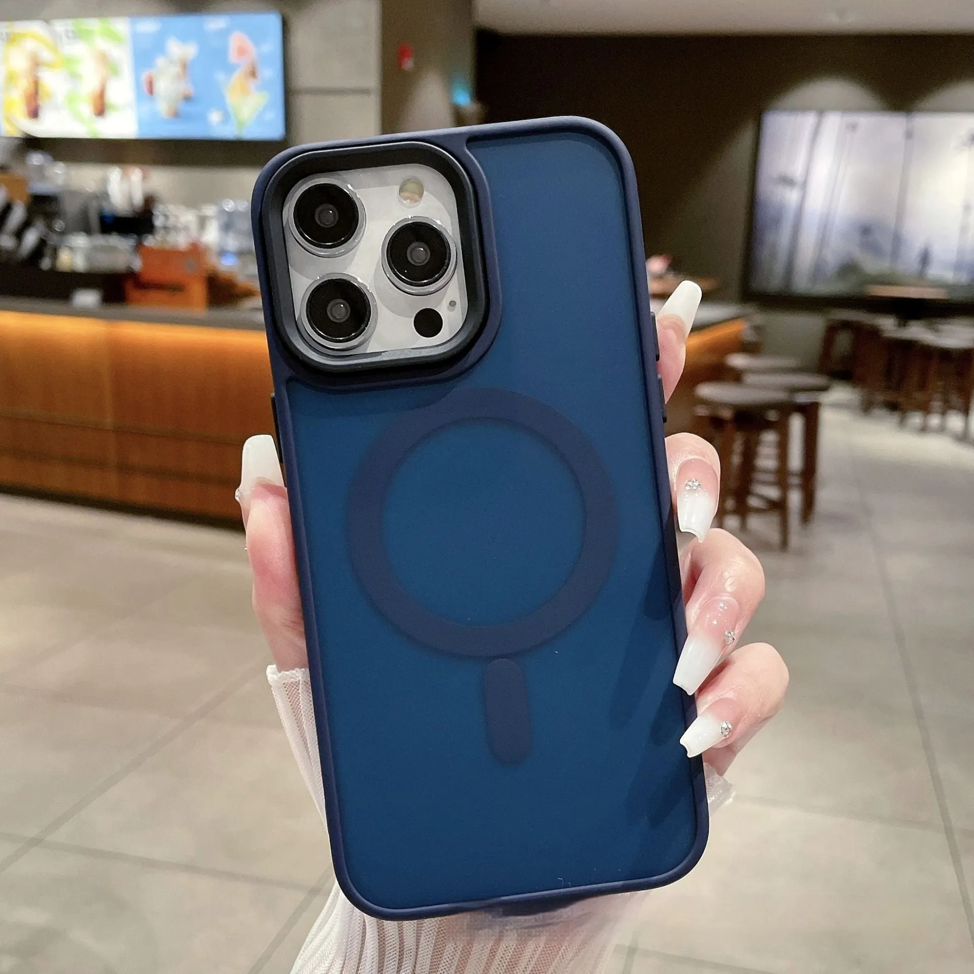 Frosted magnetic suction iPhone 16 phone case in dark purple colour showing shockproof anti-fall protection