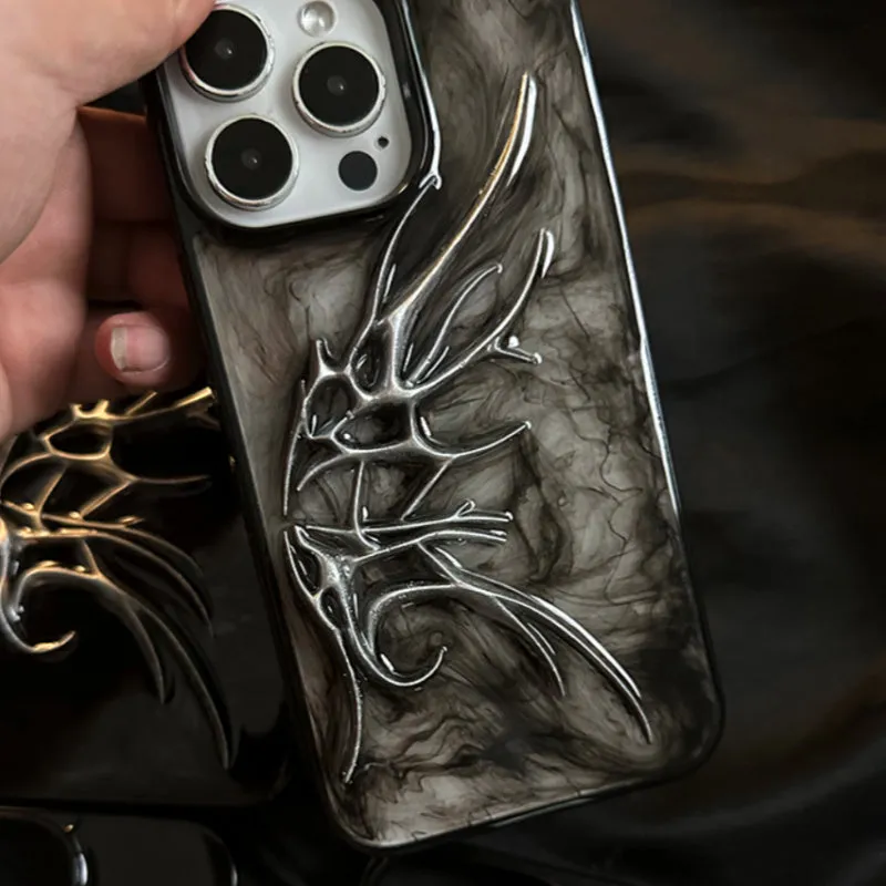 Black iPhone case with three-dimensional blurred wings design showing raised edges and precise port cutouts
